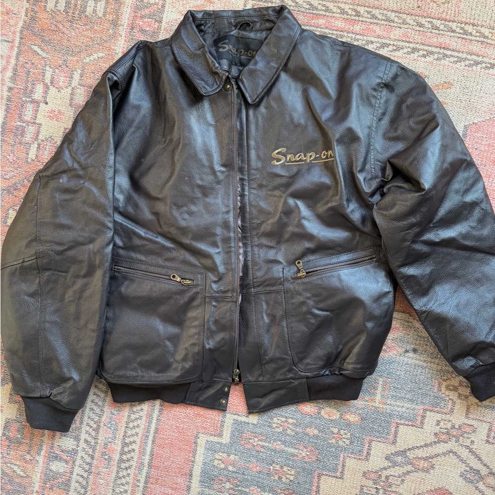 Snap-on Black Leather Bomber Jacket with Zip Pockets